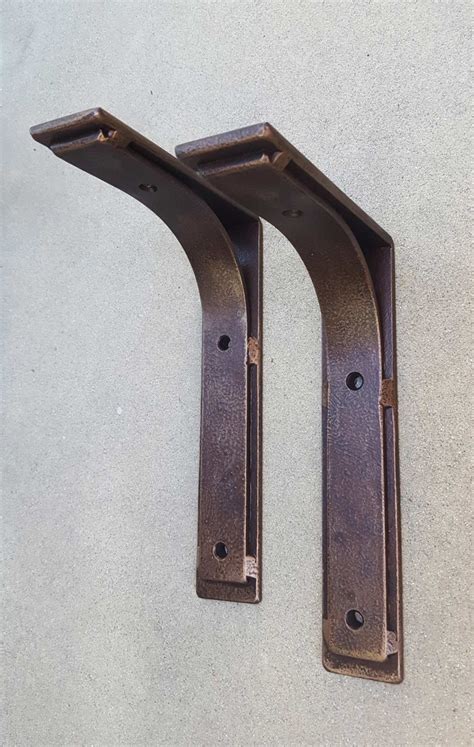 metal bracket porters|large iron brackets.